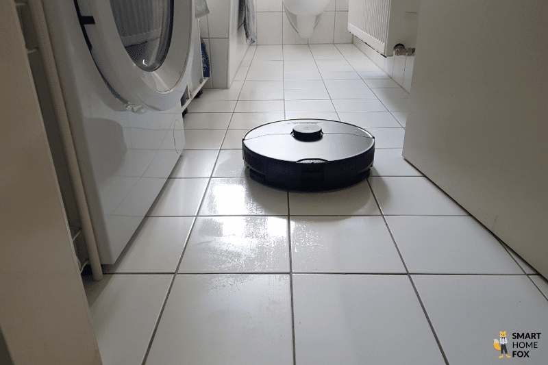 The Roborock S7 MaxV Ultra mops the bathroom floor.